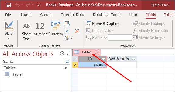 Arrow pointing to a Table tab in Access