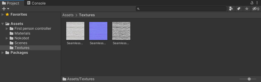 A texture, a normal map, and a specular map showing in Unity